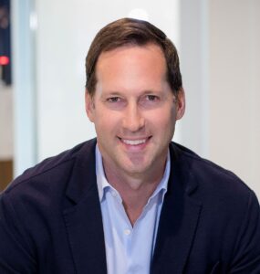 Conor Flynn is CEO of Kimco Realty Corporation (NYSE:KIM), a REIT that owns grocery-anchored shopping centers.